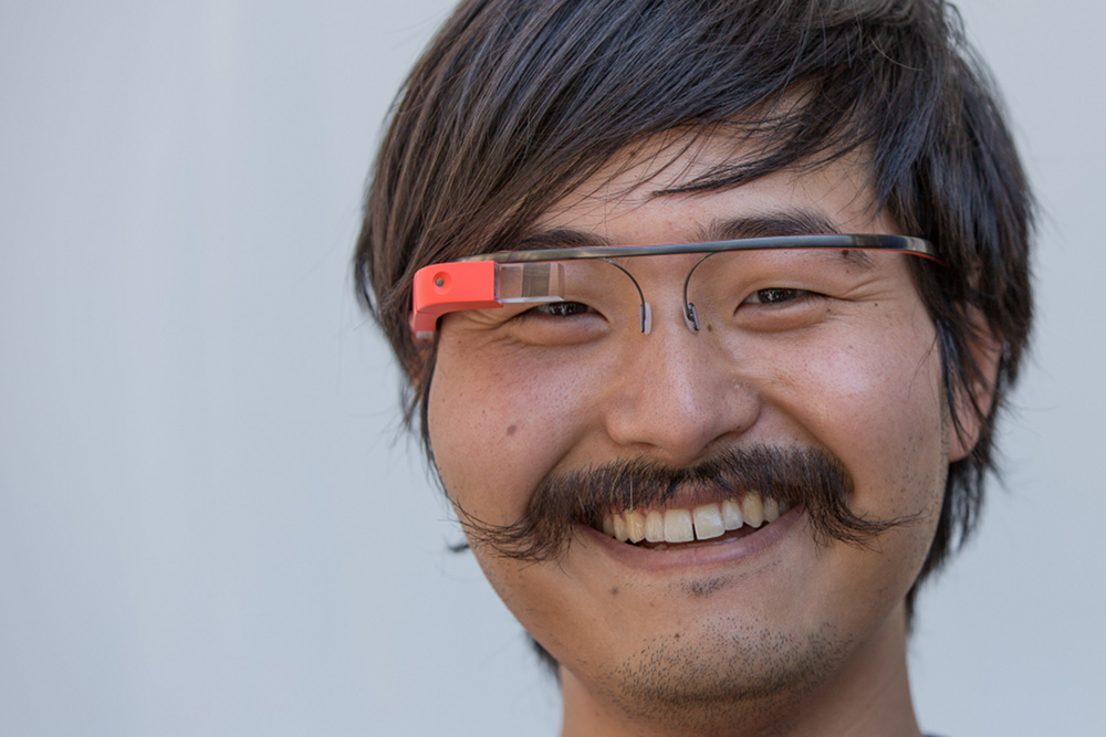 Deny Le is wearing Google Glass out of attorney office.